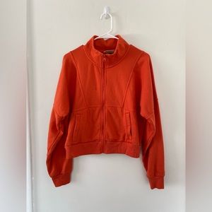 Orange half zip jacket